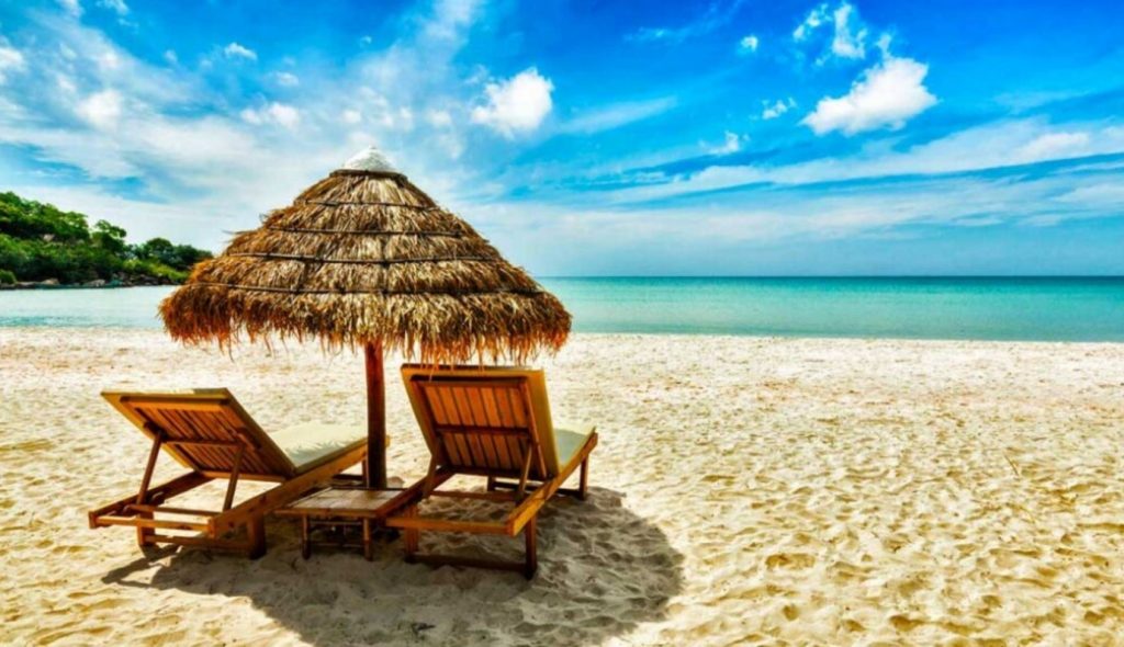 Beautiful sunny day at the beach with 2 beach chairs