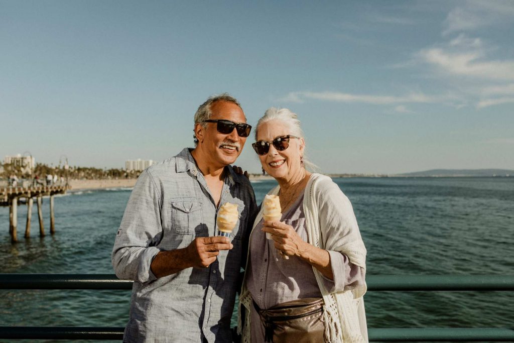 Elderly couple enjoying ice cream cones | Featured image for the Retirement Checklist Blog by Horizon Wealth Advisory.